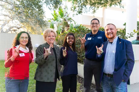 President Law with group attending Holiday Open House
