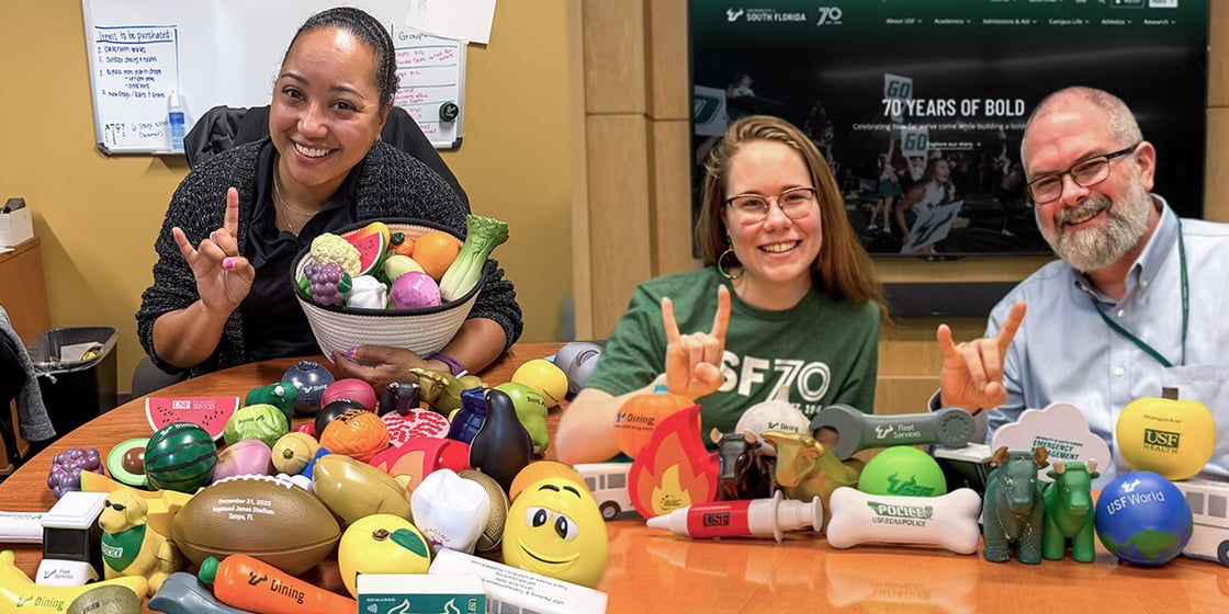 Jacki Farley, Torie Doll and Aaron Nichols display their collections.