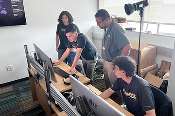 Students work at computers