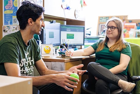 Student and advisor talk in Academic Success Center