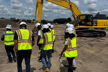 Workers at site of on-campus stadium
