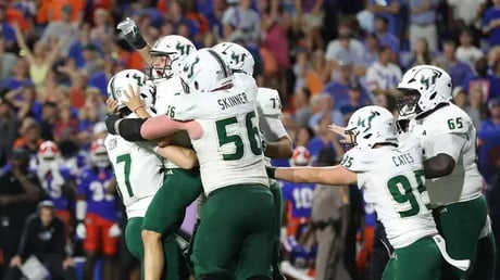 Bulls celebrate victory over the University of Florida